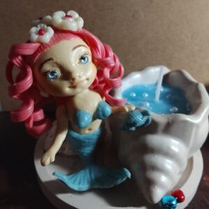 Sirena con Vela en Caracol