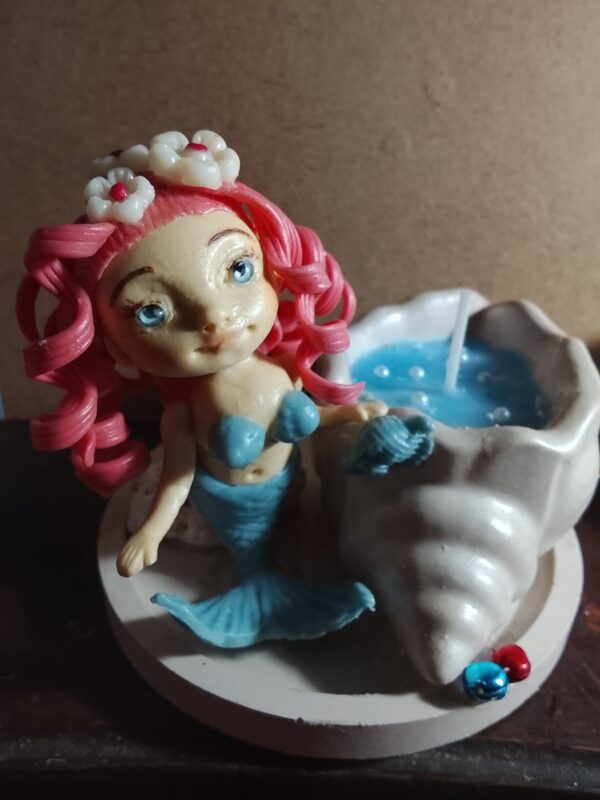Sirena con Vela en Caracol
